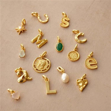 Encants inicials d'acer inoxidable